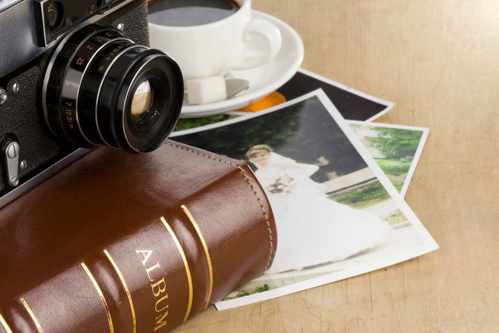 photo album and old camera with coffee
